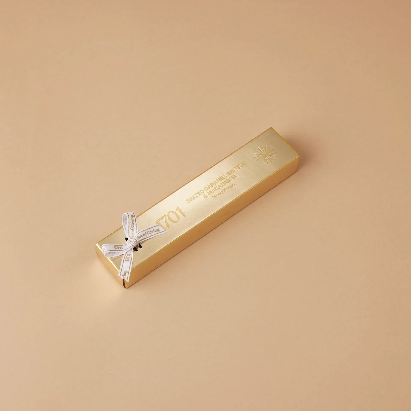 1701 salted caramel brittle & macadamia honey nougat bar 100g