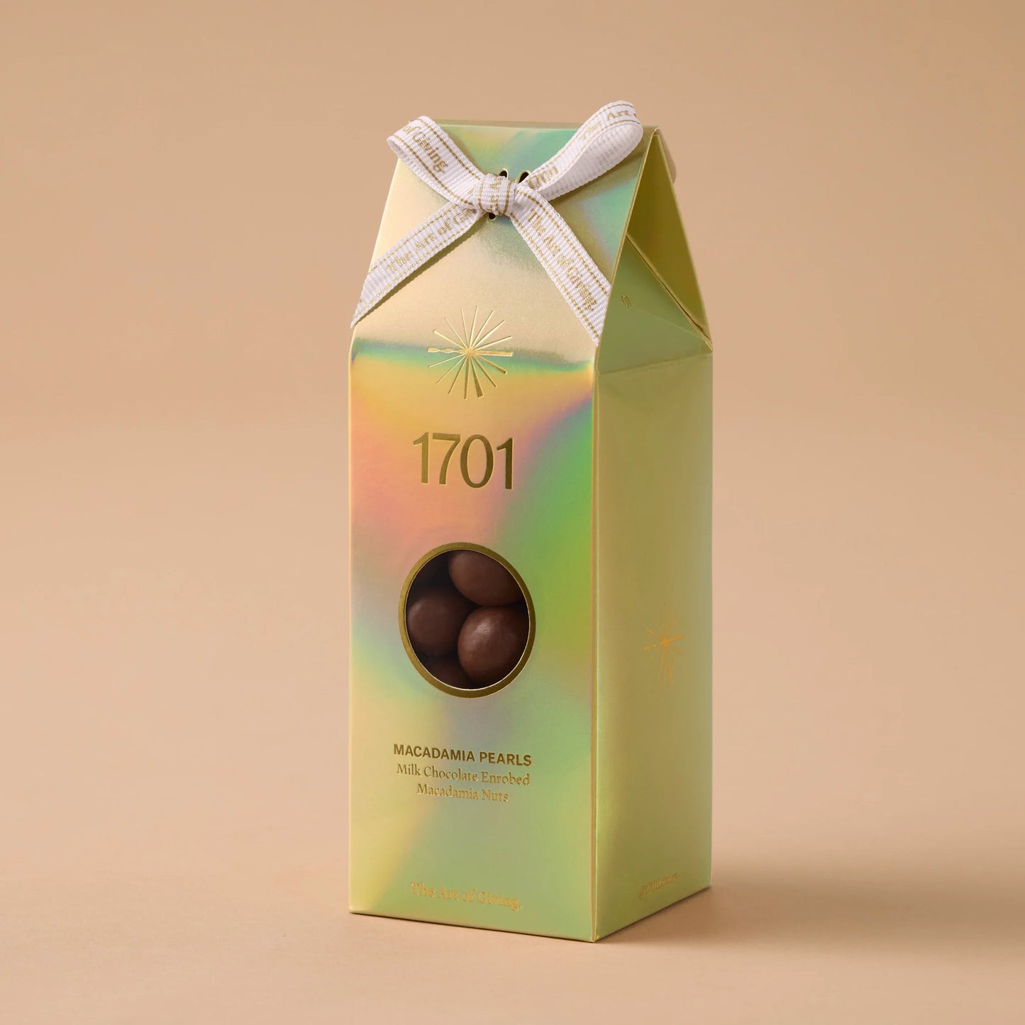 1701 milk chocolate enrobbed macadamia pearls 200 g ￼